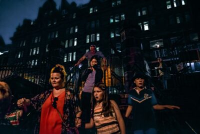 Edinburgh: Comedy Horror Ghost Bus Tour - Necropolis Bus Company details inside the midnight-black ride